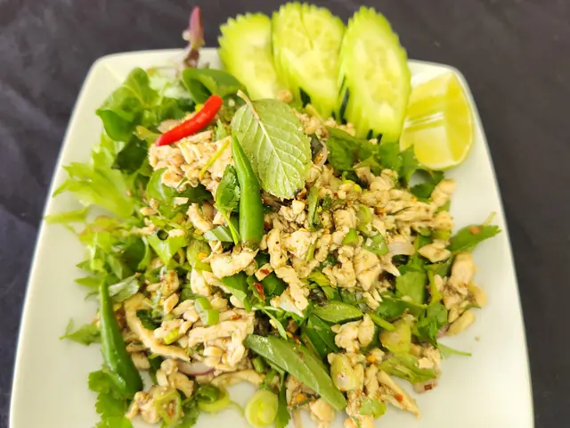 Laab — a minced meat salad with herbs, lime and toasted rice powder.