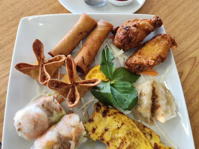 The Sab Sampler — an assortment of fried appetisers with dipping sauces.